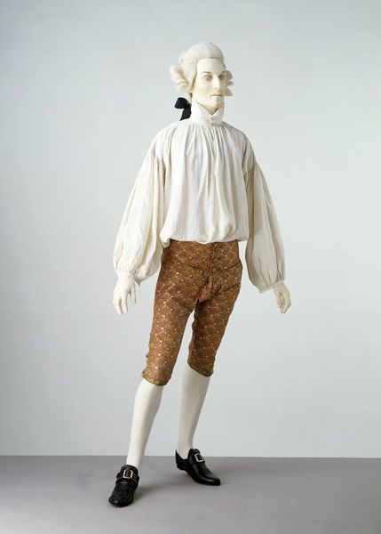 Man in 18th Century shirt and breeches
